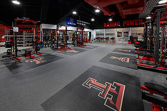 Texas Tech Volleyball upgraded their strength training area at the United Supermarkets Arena with a number of weight training racks.