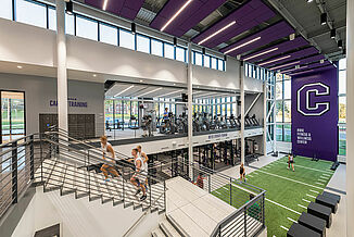 Cornell College - View of Facility Cornell College's Athletic and Wellness center that features REGUPOL flooring throughout the facility. A view of the cardio area upstairs and the weight training facility on the lower level.