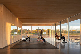 Neil Campbell Rowing Centre - Individuals Exercising Inside view of the Neil Campbell Rowing Centre as various individuals work out on the REGUPOL aktivpro rubber tile flooring.