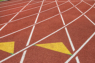 A close up look at the texture of the REGUPOL champion AG track found at Franklin and Marshall College.