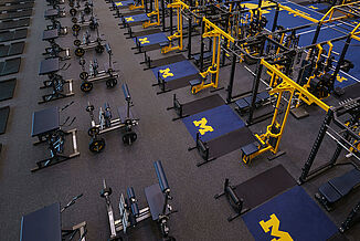 The Michigan football performance center features REGUPOL aktivpro roll inlaid platforms. The Michigan football performance center features REGUPOL aktivpro roll inlaid platforms.