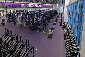 Full view of TCU football performance center. The room offers athletes a variety of equipment and tools to strengthen performance.