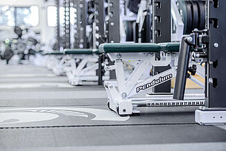 View of REGUPOL crash zones located within the Michigan State football weight lifting facility.