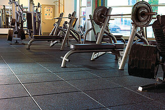 Temple University Fitness - Benches and REGUPOL aktipro Two weight benches sit on Temple University's REGUPOL aktipro rubber flooring.