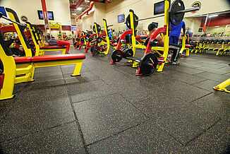 REGUPOL aktivpro tiles featured in Retro Fitness Stroudsburg's free weight section.